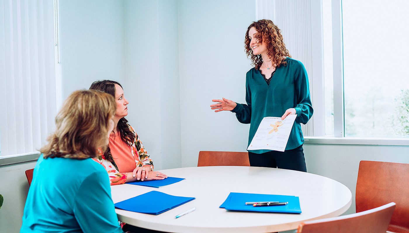 Chelsea-Dorough-presenting-diagram-to-two-women